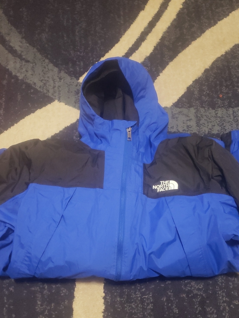 The North Face Kids Blue and Black Hooded Puffer Jacket